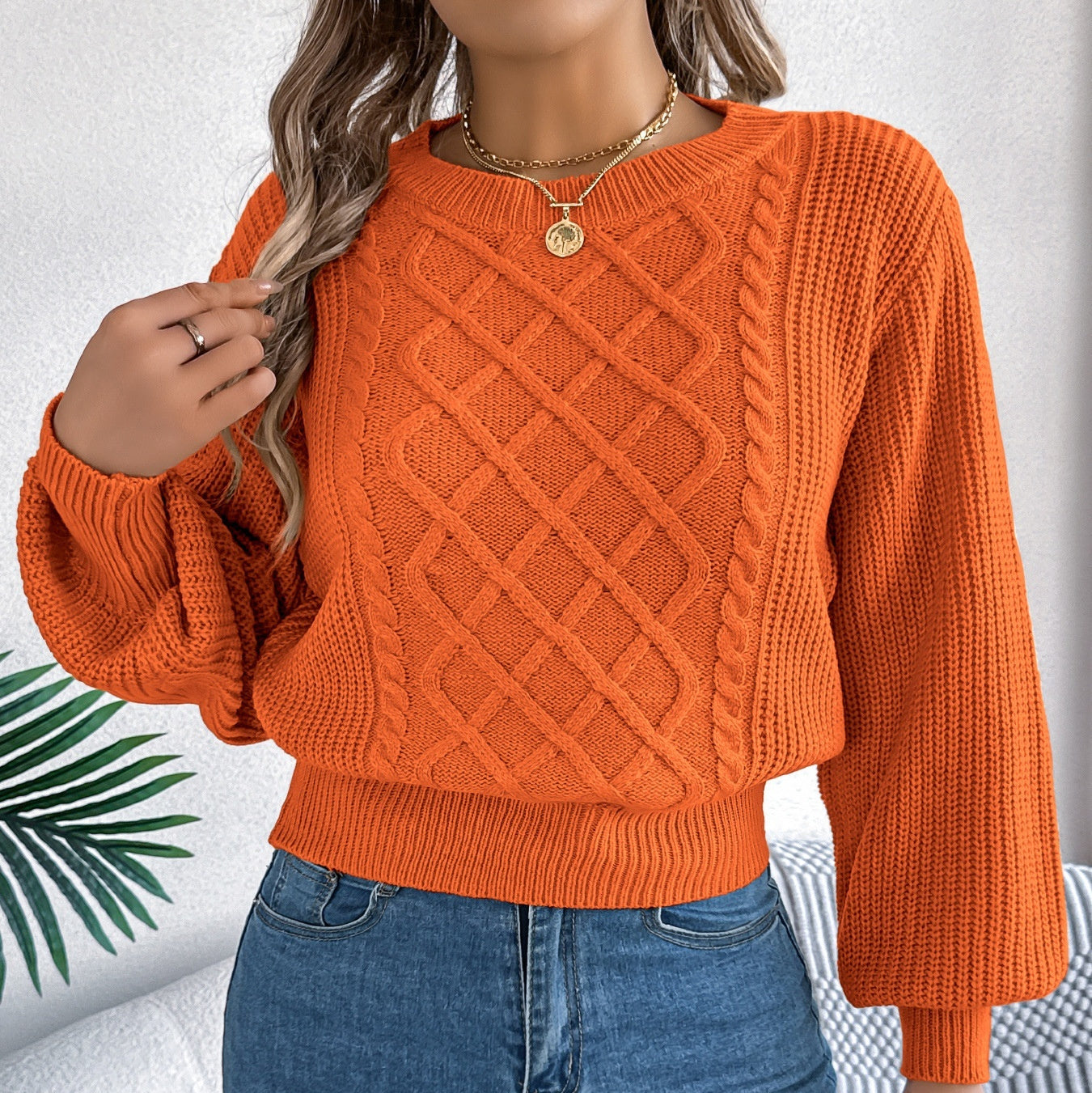 Pull Torsadé Élégant